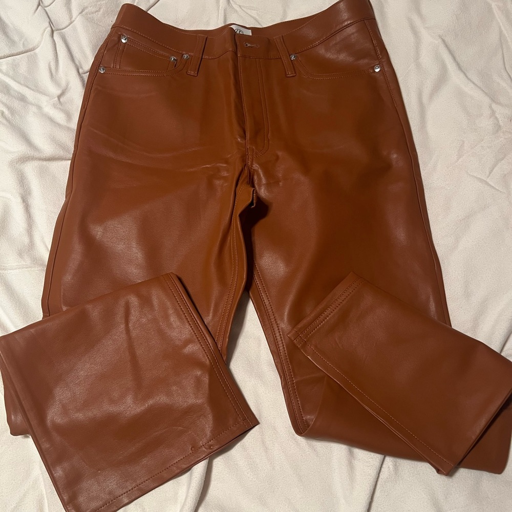 Never worn J Crew slim wide leg pant in faux leather. Sold out at J Crew!